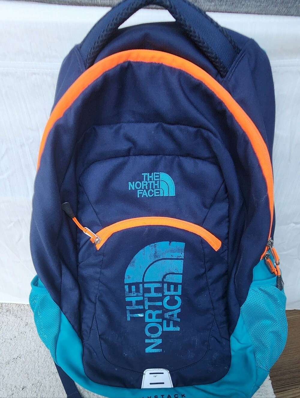 The North Face Navy & Teal Backpack with Orange Accents